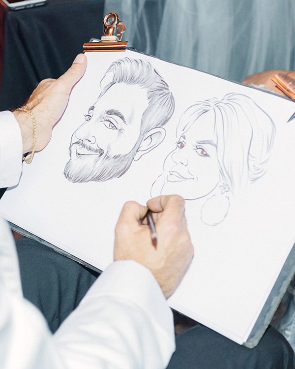 Caricatures are a fun and interactive wedding favour for your guests | Sandra Åberg Photography via Martha Stewart Weddings