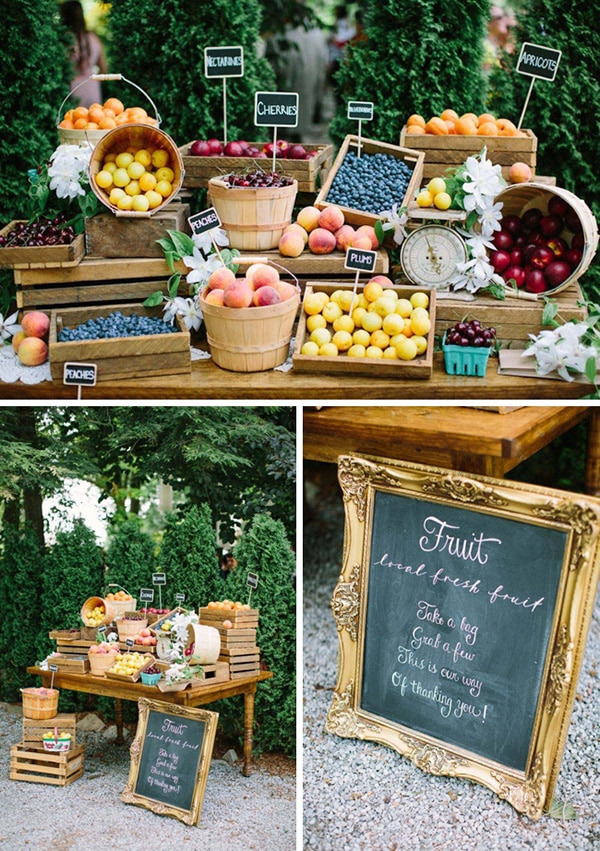 Local fresh fruit display for guests to take home as wedding favors - 'Take a bag, grab a few, this is our way of thanking you' | Andrew Mark Photography via Weddingbells