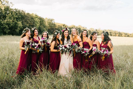 Bohemian burgundy bridesmaid dresses | Sarah Libby Photography via Junebug Weddings