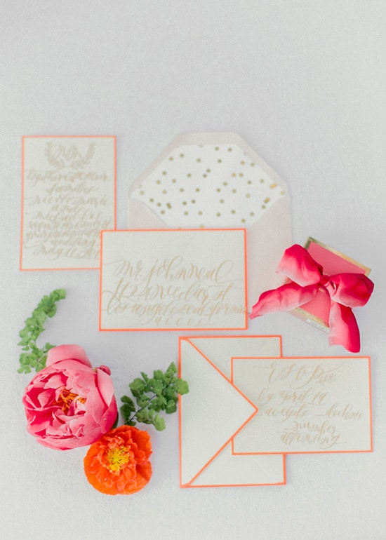 Bright neon pink and orange wedding stationery | Kelle Sauer via Grey Likes Weddings
