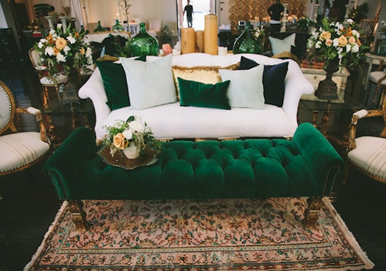 White and green velvet lounge setting with gold accent pillow | Paige Jones via 100 Layer Cake