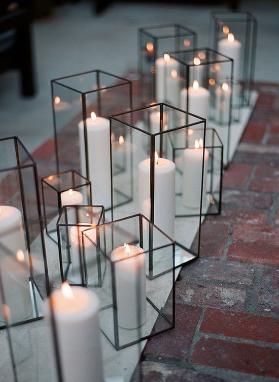 Modern black wedding lanterns with white pillar candles | Greg Finck via 100 Layer Cake