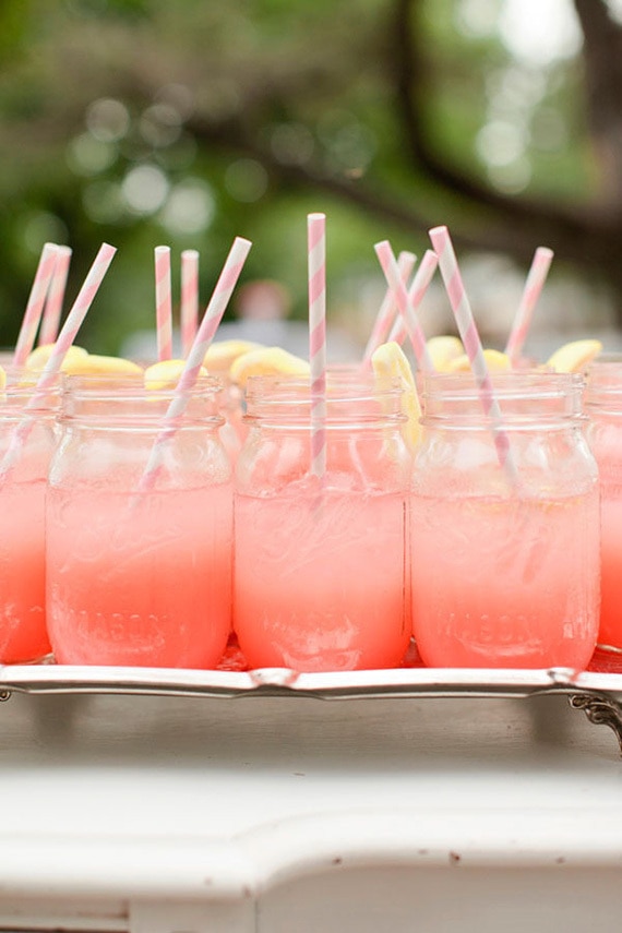 Ombre coral wedding cocktails with lemon wedge | Bonnie Berry Photography via Style Me Pretty